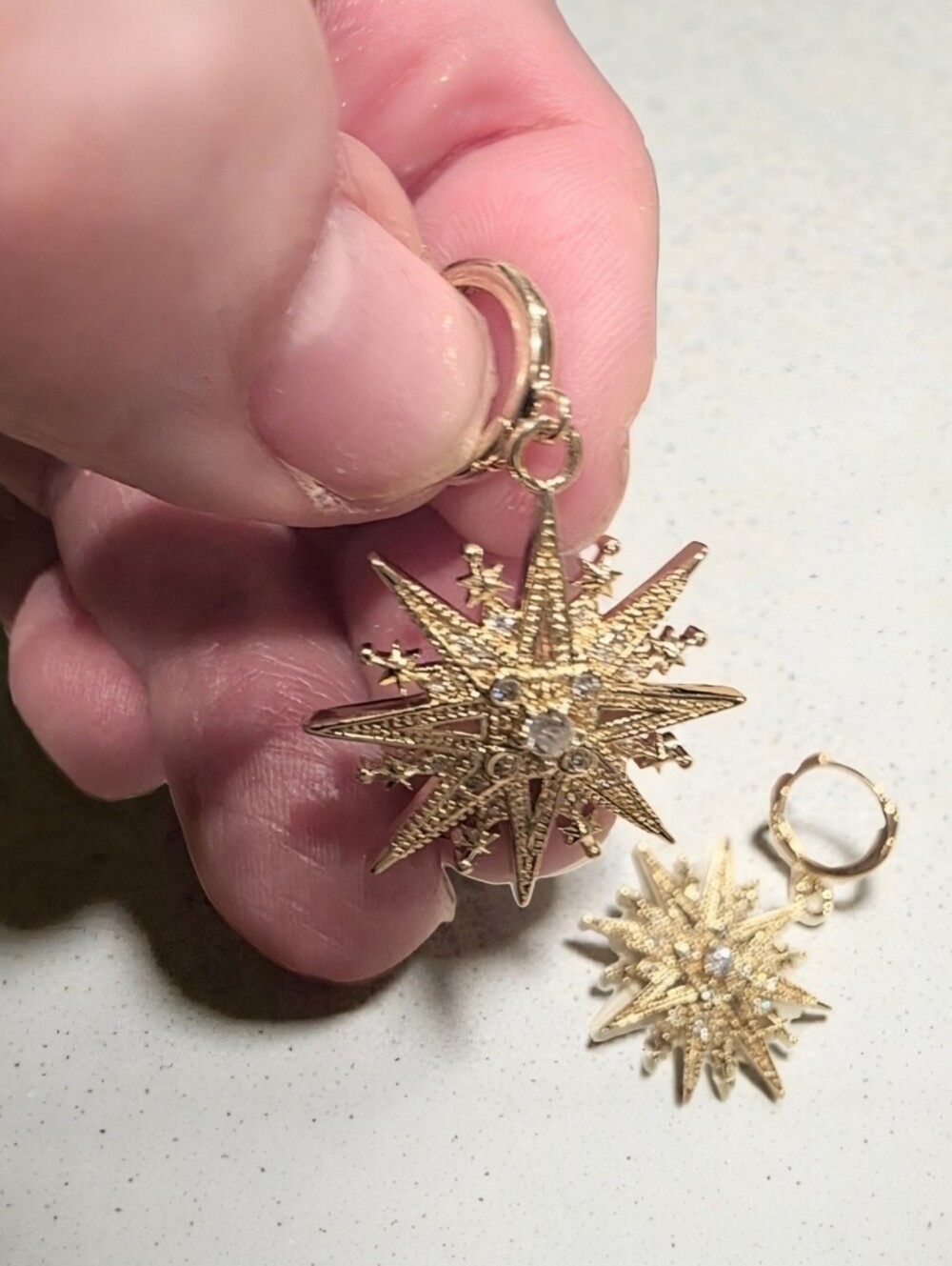 Gold and zirconia starburst earrings; amazing quality; nwot
